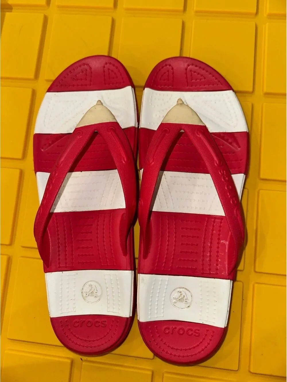 Crocs red and white flip flops size men’s 11